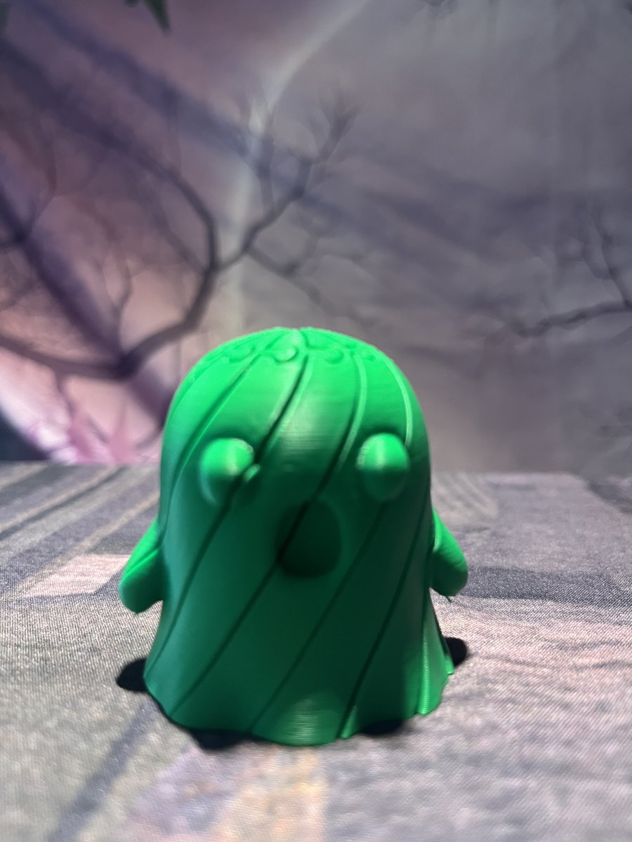 Green Articulated Ghost Fidget standing upright